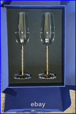 Swarovski Crystalline Toasting Champagne Flutes 5102143 Gold Toned Set of 2 NIB