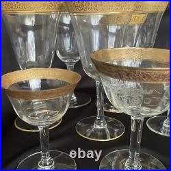 Tiffin-Franciscan clear optic crystal with a gold-encrusted band rim. Set