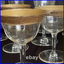 Tiffin-Franciscan clear optic crystal with a gold-encrusted band rim. Set