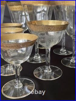Tiffin-Franciscan clear optic crystal with a gold-encrusted band rim. Set