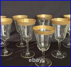Tiffin-Franciscan clear optic crystal with a gold-encrusted band rim. Set