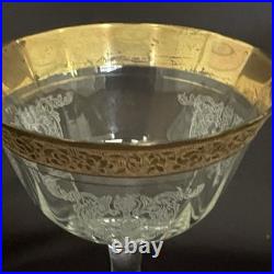 Tiffin-Franciscan clear optic crystal with a gold-encrusted band rim. Set