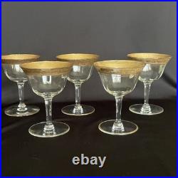 Tiffin-Franciscan clear optic crystal with a gold-encrusted band rim. Set