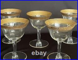 Tiffin-Franciscan clear optic crystal with a gold-encrusted band rim. Set