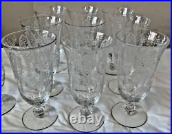 Vintage etched glass goblets with floral patterns perfect crystal. Set